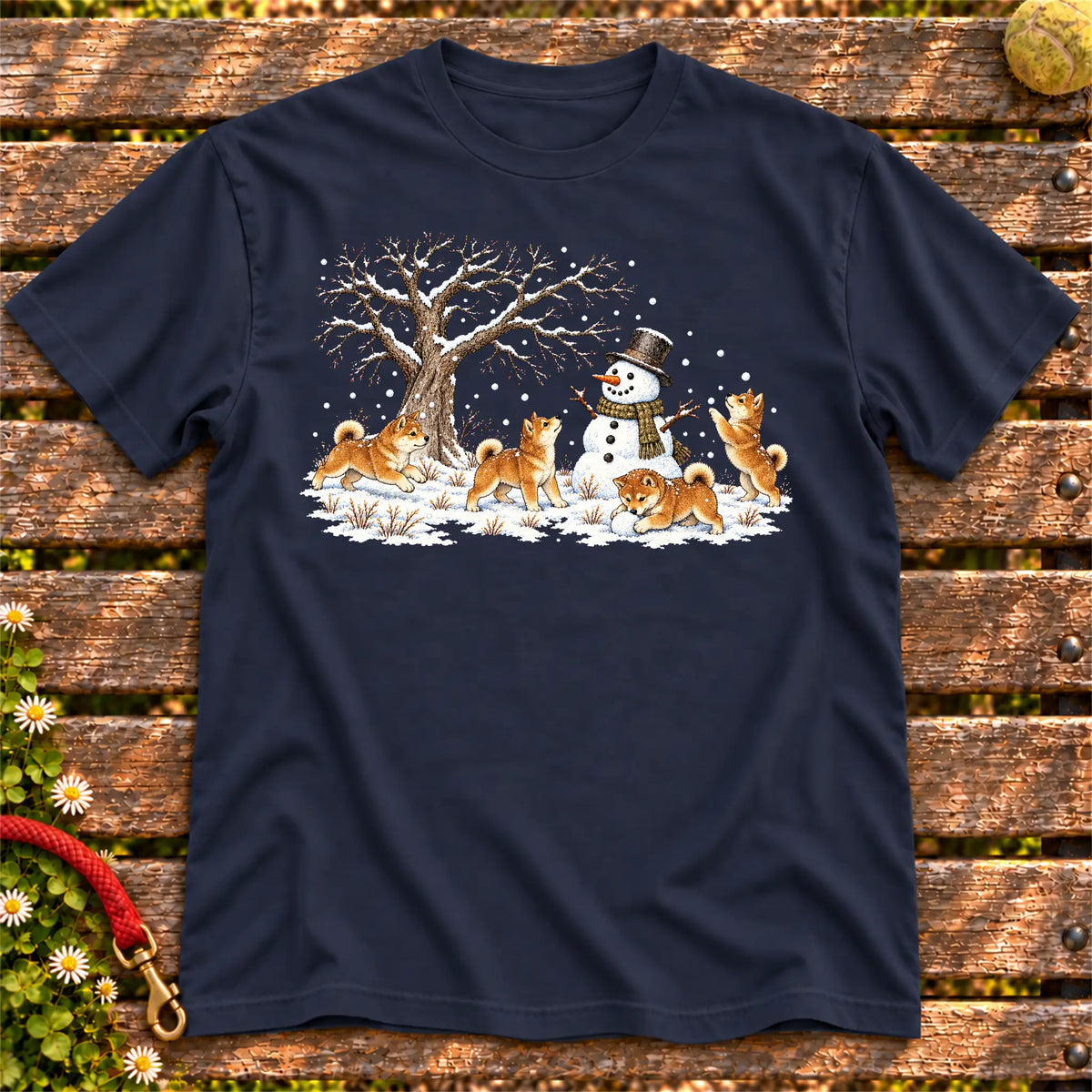 Shiba Inu puppies playing in snow with a snowman on a Navy T-shirt
