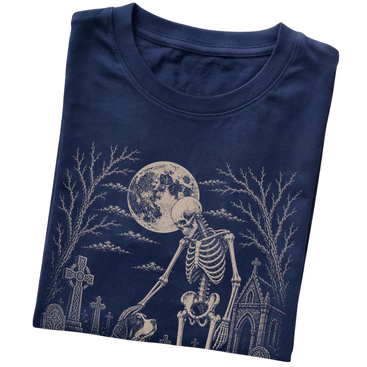 Folded Navy T-shirt with a skeleton petting a Bernese Mountain Dog in a graveyard