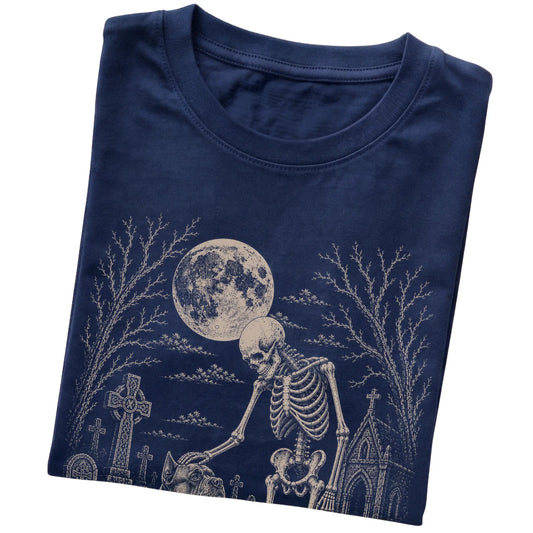 Folded Navy T-shirt with a skeleton petting a Cane Corso in a graveyard