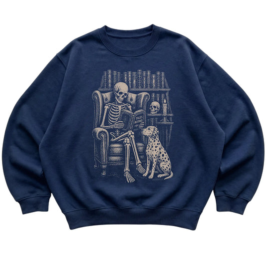 Skeleton reading Tales Beyond to a Dalmatian on a Navy sweatshirt