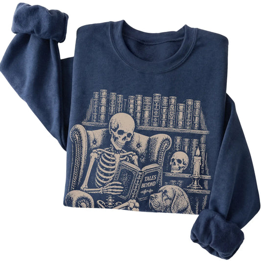 Folded Navy sweatshirt with a skeleton reading Tales Beyond to a Newfie