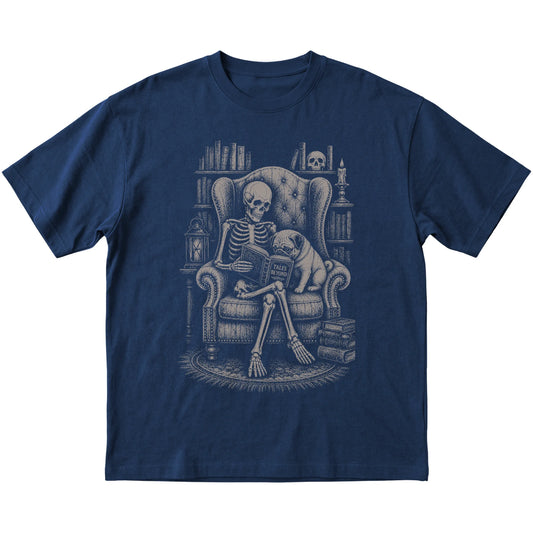 Skeleton reading Tales Beyond to a Pug on a Navy T-shirt