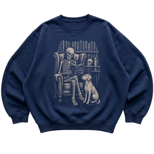 Skeleton reading Tales Beyond to a Vizsla on a Navy sweatshirt