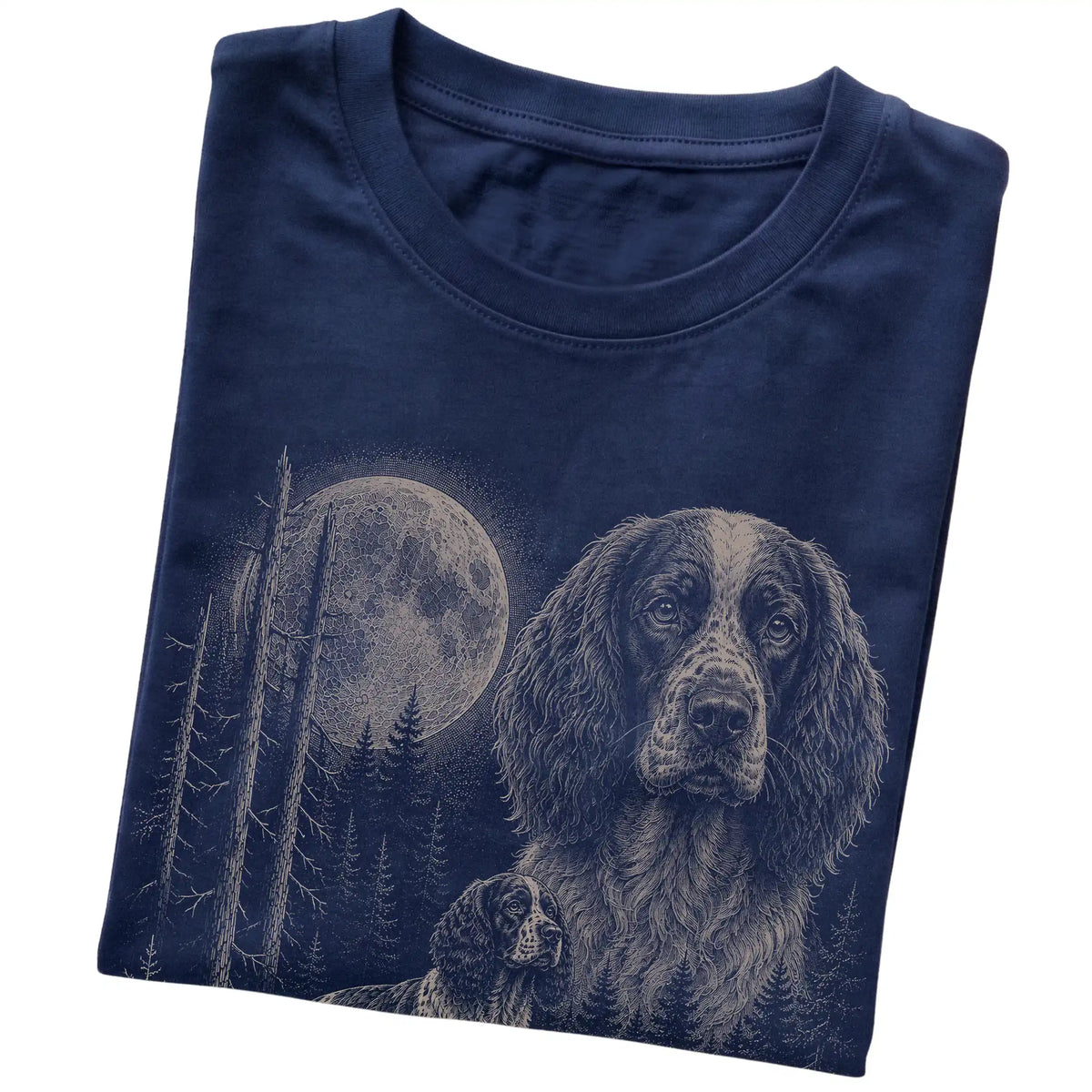Folded navy Softstyle T-shirt showing the Springer Spaniel Moonlit Forest graphic