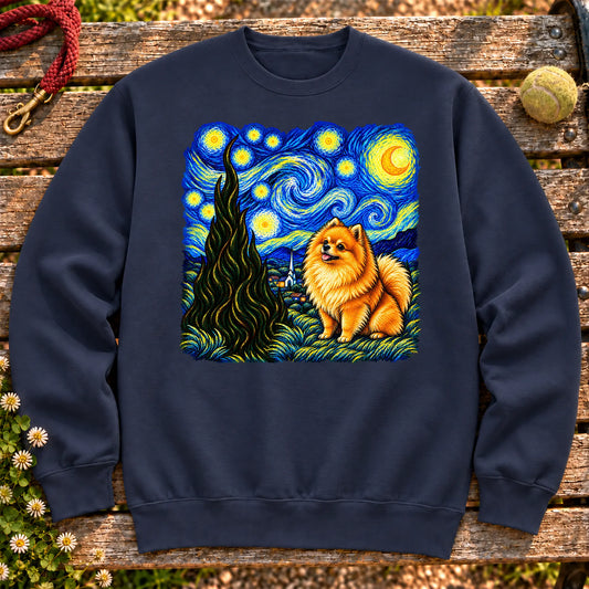 Colorful Pomeranian beneath a swirling starry night sky on a Navy sweatshirt