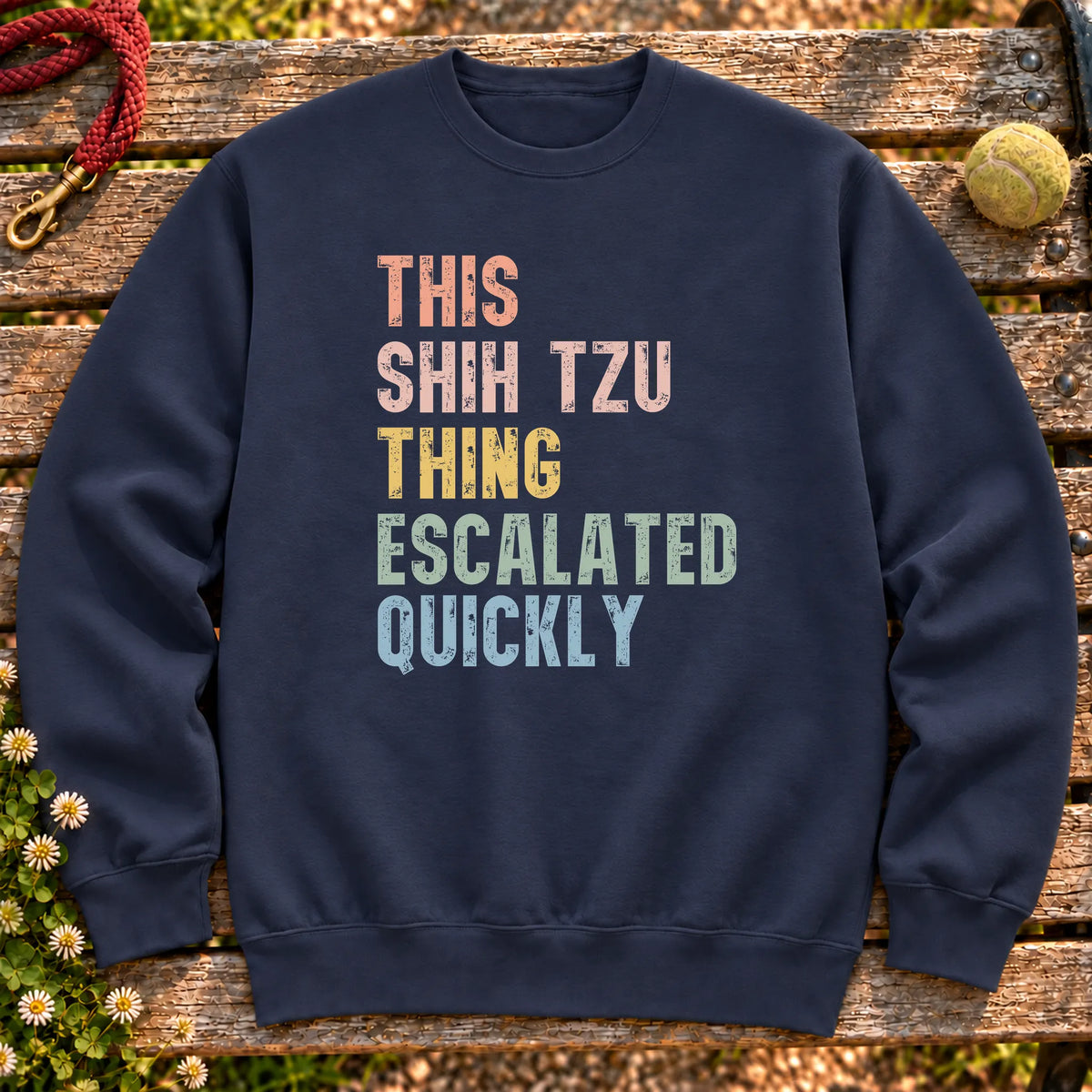 “This Shih Tzu thing escalated quickly” text on a Navy sweatshirt