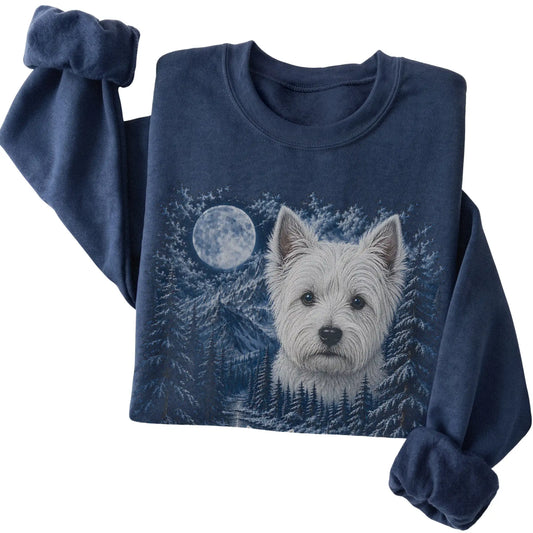 Folded navy sweatshirt with Westie Winter Moon artwork.