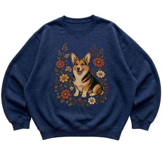 Navy crewneck sweatshirt with Corgi portrait and wildflowers, flat lay
