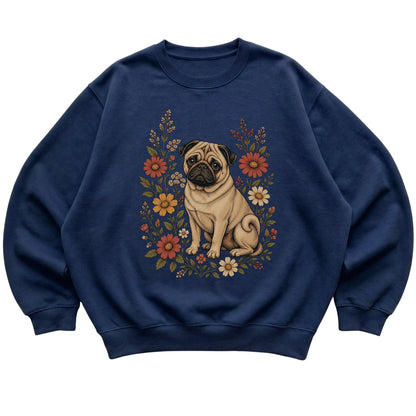 Navy crewneck sweatshirt with Pug portrait and wildflowers, flat lay