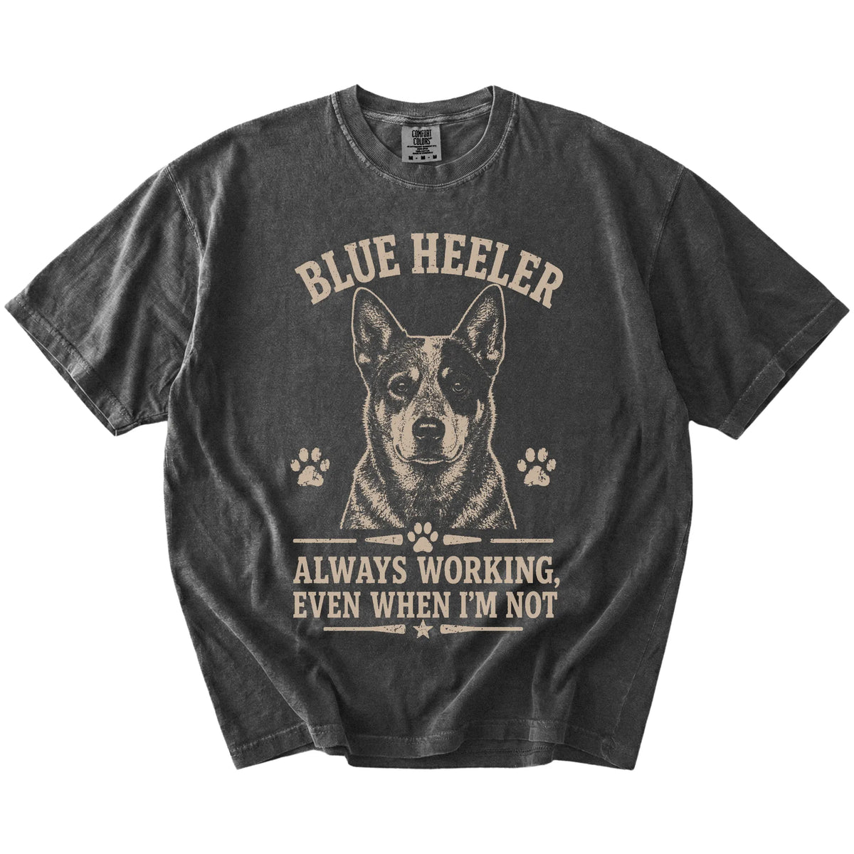 Blue Heeler design with “Always Working, Even When I'm Not” lettering on a Pepper Comfort Colors® T-shirt