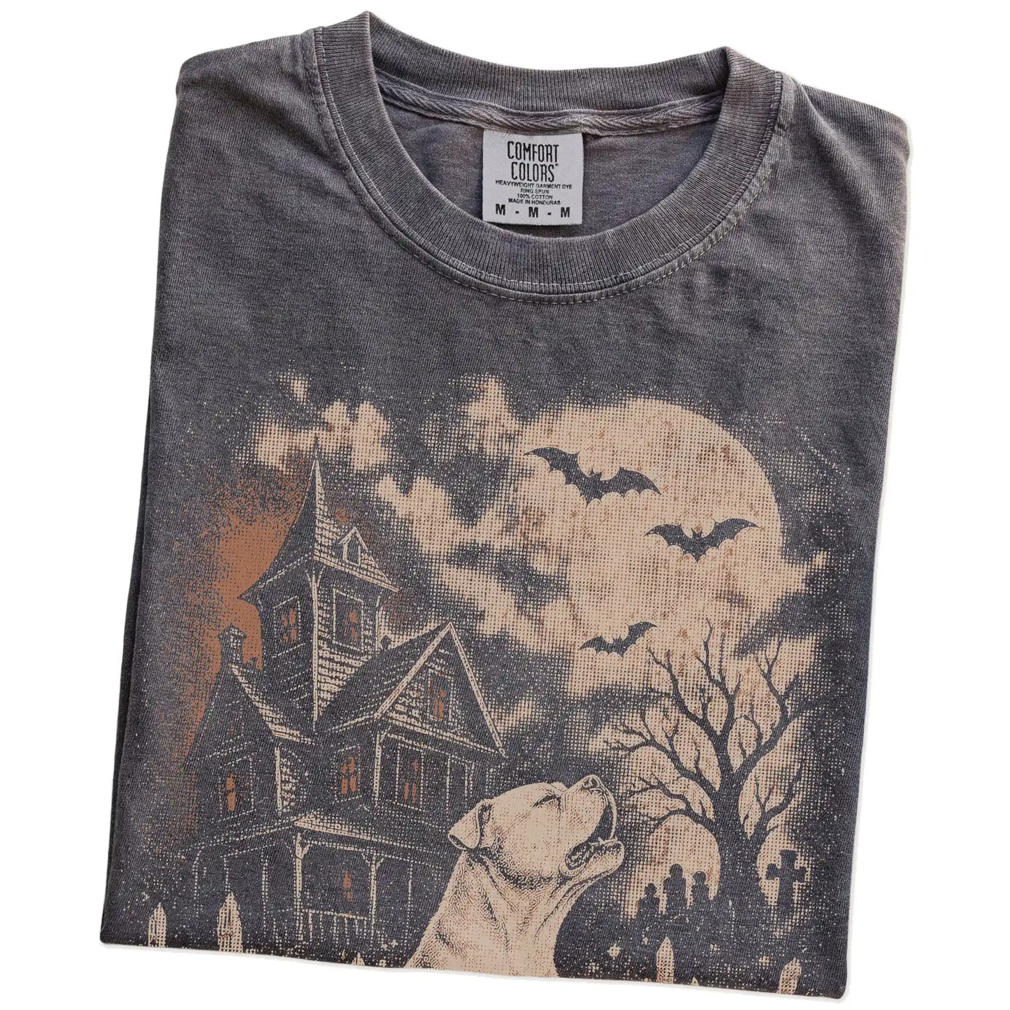 Folded Pepper Comfort Colors® T-shirt showing American Bulldog in a vintage haunted-house scene