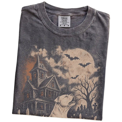 Folded Pepper Comfort Colors® T-shirt showing American Bulldog in a vintage haunted-house scene