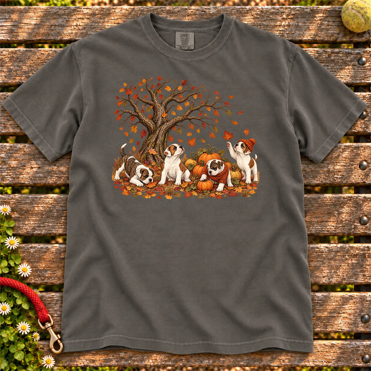 Four American Bulldog puppies with pumpkins beneath an autumn tree on a Pepper garment-dyed T-shirt