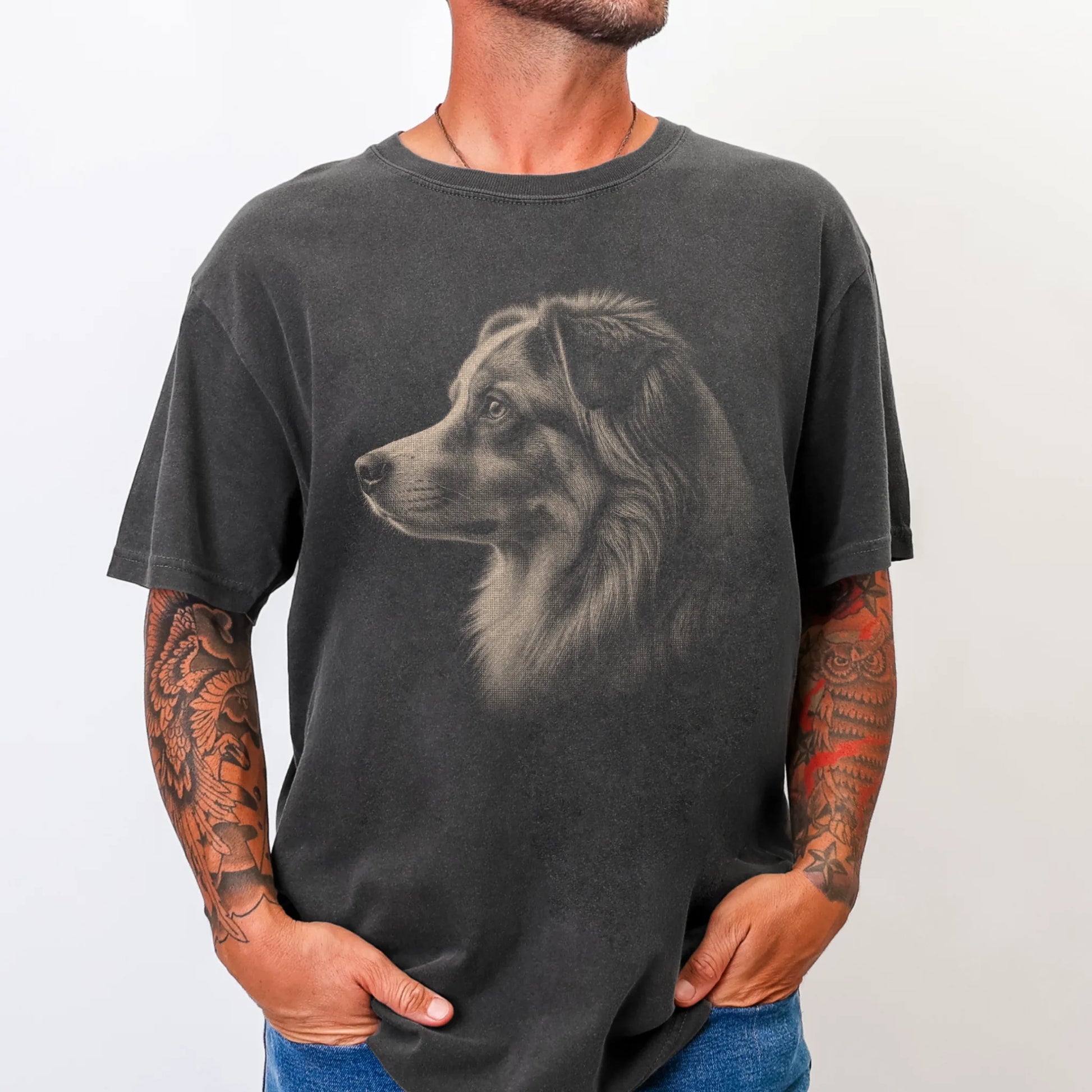 Model wearing a Pepper Comfort Colors® T-shirt with a detailed photographic portrait of a Australian Shepherd