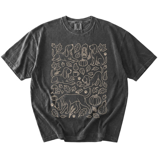 Bloodhound dogs with pumpkins, leaves, acorns, and woodland details on a Pepper Comfort Colors® T-shirt