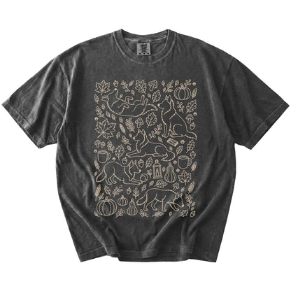 Border Collie dogs with pumpkins, leaves, acorns, and woodland details on a Pepper Comfort Colors® T-shirt