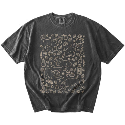 Bulldog dogs with pumpkins, leaves, acorns, and woodland details on a Pepper Comfort Colors® T-shirt