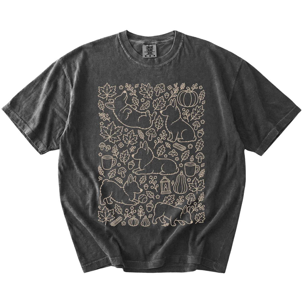 Corgi dogs with pumpkins, leaves, acorns, and woodland details on a Pepper Comfort Colors® T-shirt