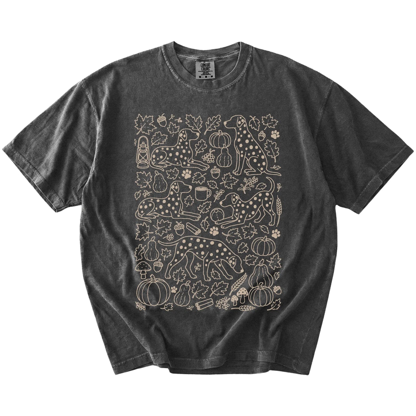 Dalmatian dogs with pumpkins, leaves, acorns, and woodland details on a Pepper Comfort Colors® T-shirt