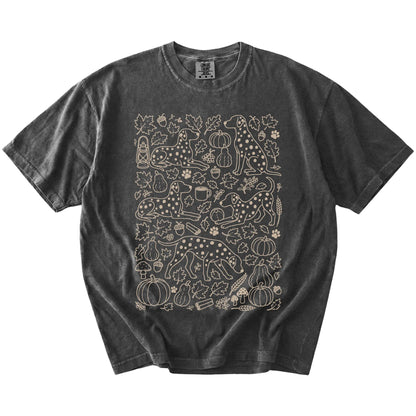 Dalmatian dogs with pumpkins, leaves, acorns, and woodland details on a Pepper Comfort Colors® T-shirt