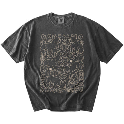 French Bulldog dogs with pumpkins, leaves, acorns, and woodland details on a Pepper Comfort Colors® T-shirt