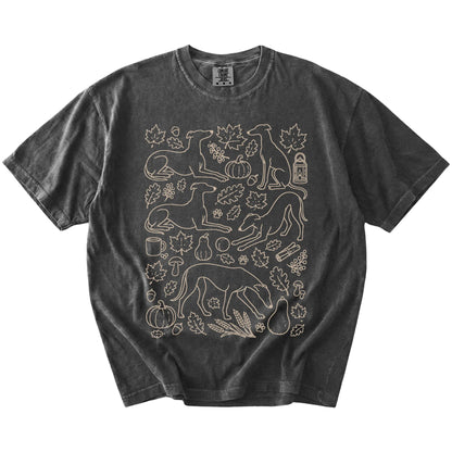Greyhound dogs with pumpkins, leaves, acorns, and woodland details on a Pepper Comfort Colors® T-shirt
