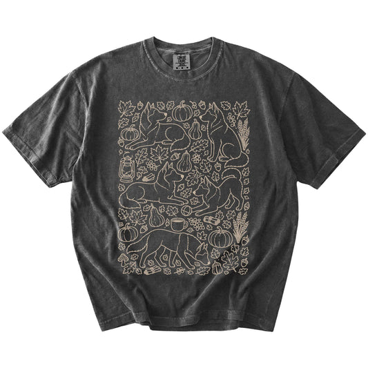 Husky dogs with pumpkins, leaves, acorns, and woodland details on a Pepper Comfort Colors® T-shirt