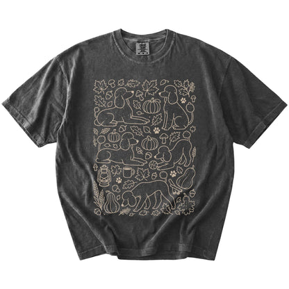 Poodle dogs with pumpkins, leaves, acorns, and woodland details on a Pepper Comfort Colors® T-shirt