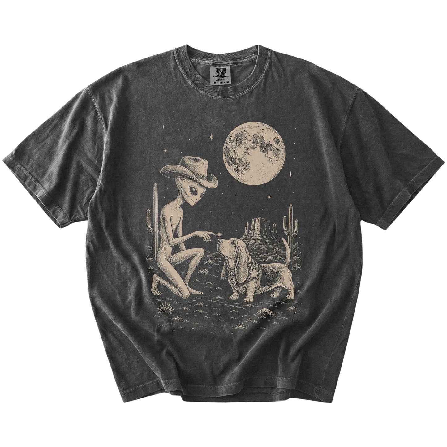 Cowboy alien fist-bumping a Basset Hound beneath the moon on a Pepper Comfort Colors® T-shirt