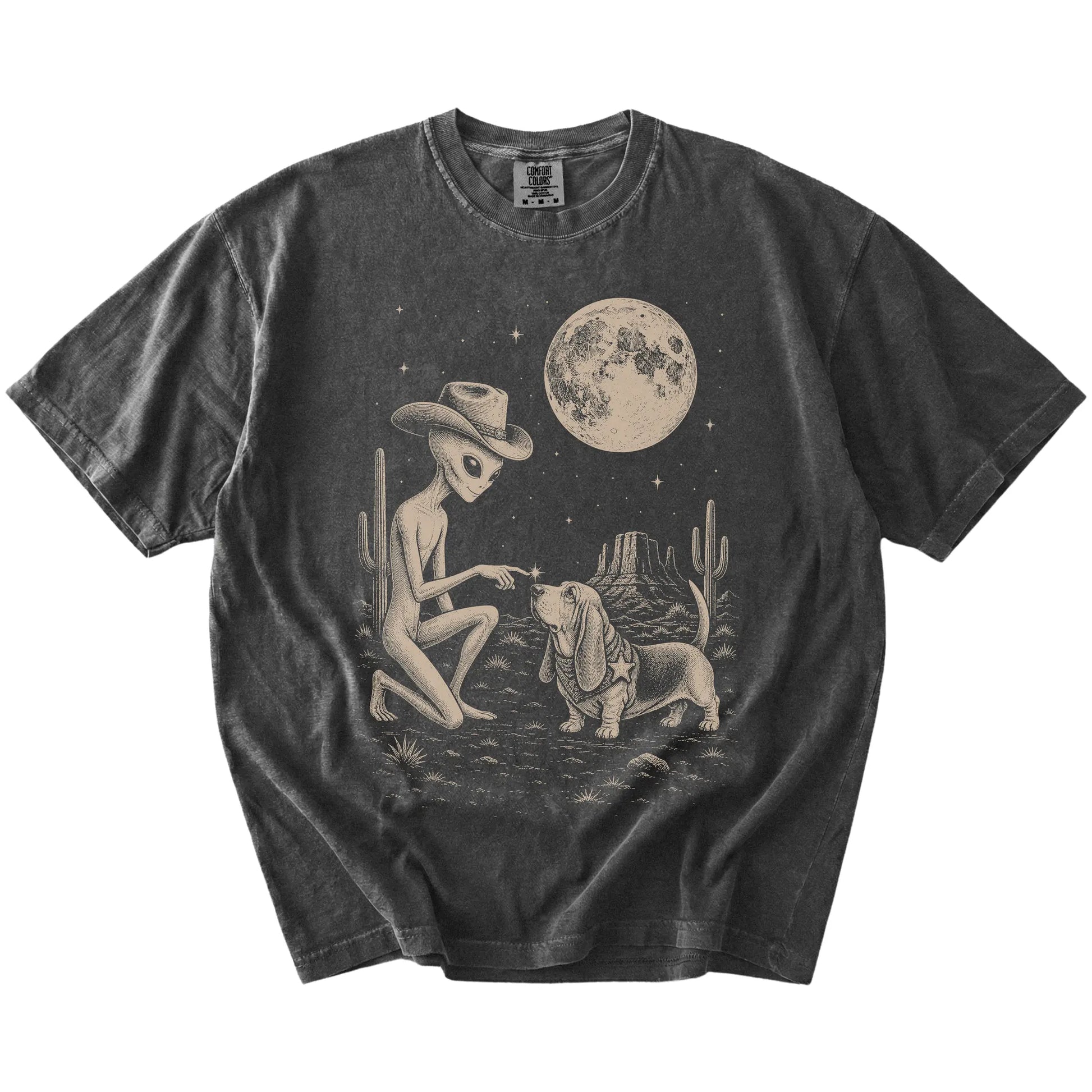 Cowboy alien fist-bumping a Basset Hound beneath the moon on a Pepper Comfort Colors® T-shirt