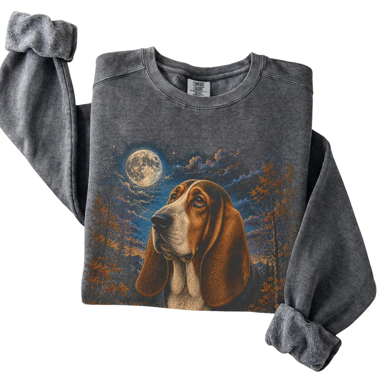 Folded pepper sweatshirt with Basset Hound Autumn Moon artwork.