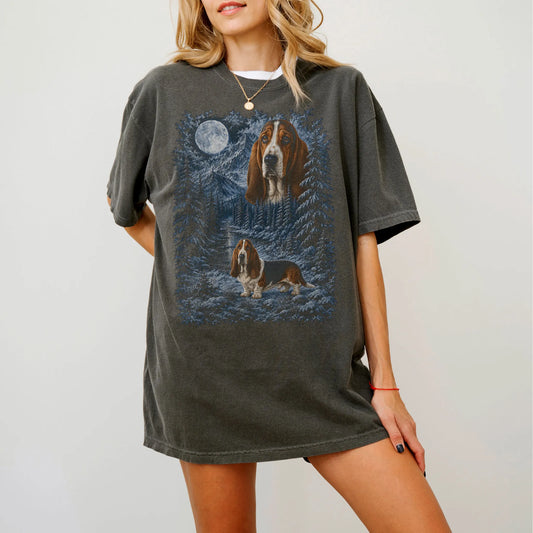 Person wearing a Pepper Basset Hound winter forest t-shirt