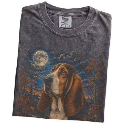 Folded Pepper Comfort Colors® t-shirt showing Basset Hound in a fall forest graphic