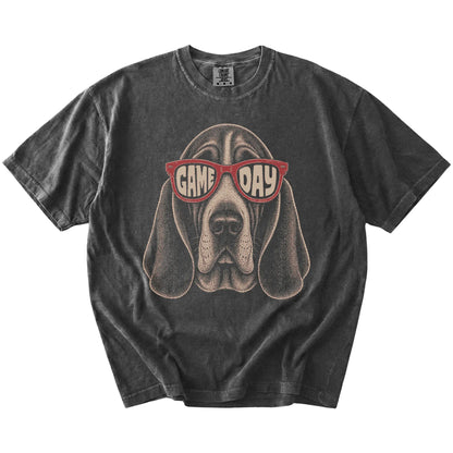 Basset Hound wearing red Game Day sunglasses on a Pepper Comfort Colors® T-shirt