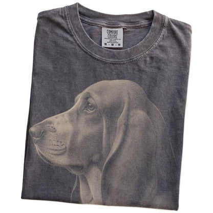Folded Pepper Comfort Colors® T-shirt showing a detailed photographic portrait of a Basset Hound