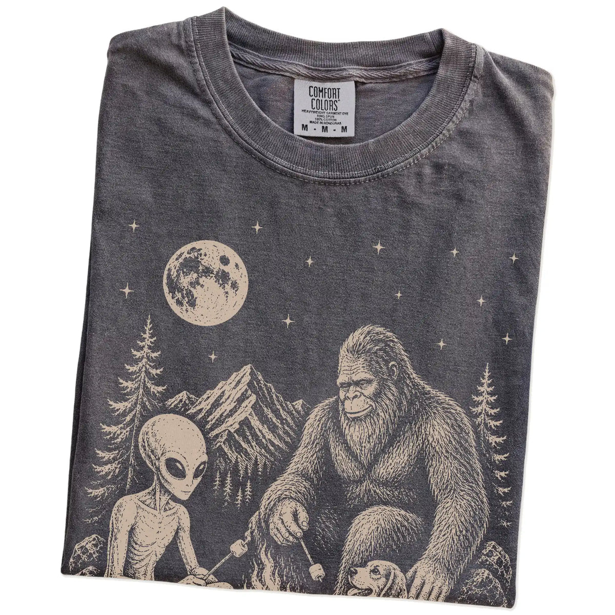 Folded Pepper Comfort Colors® T-shirt showing Beagle camping with Bigfoot and an alien