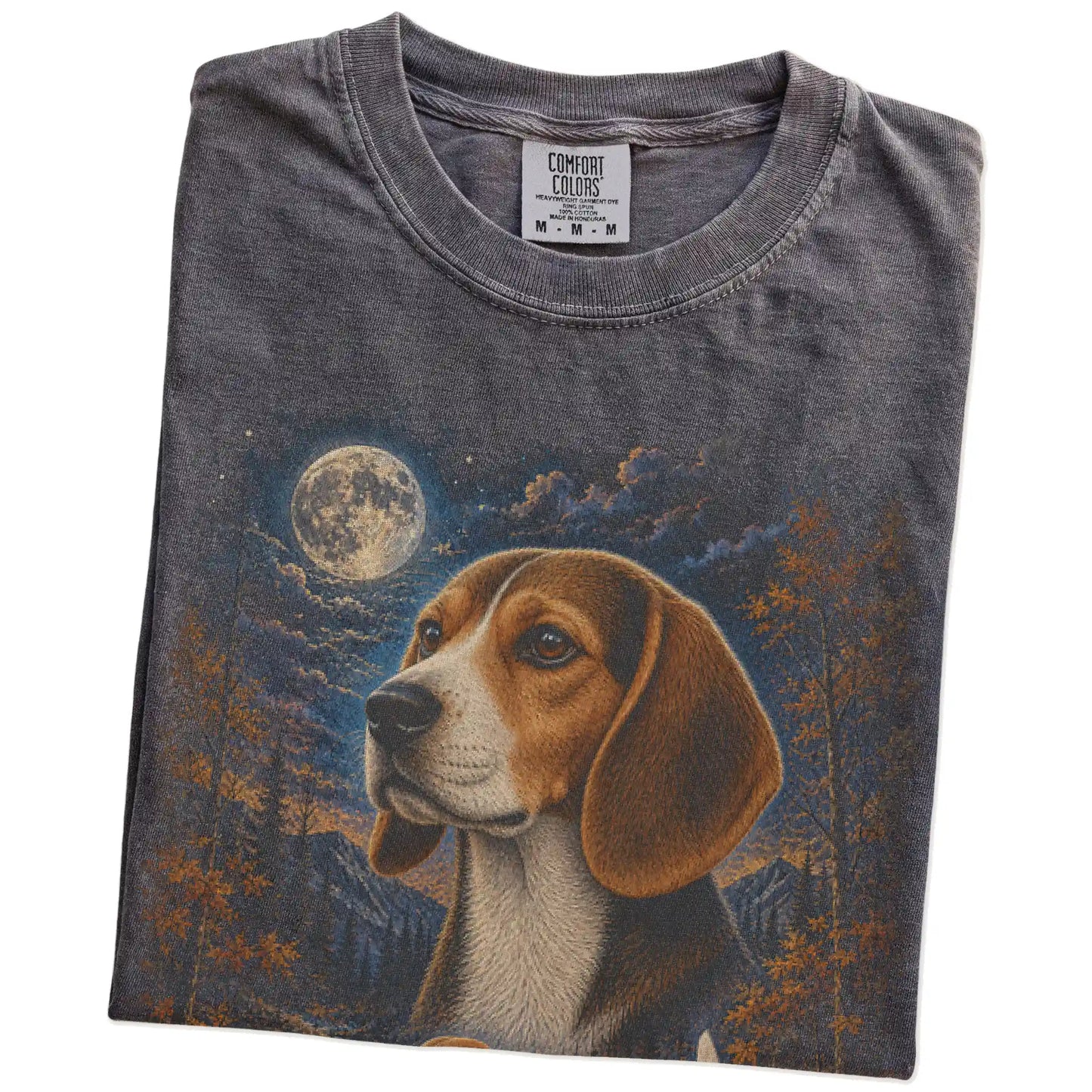 Folded Pepper Comfort Colors® t-shirt showing Beagle in a fall forest graphic