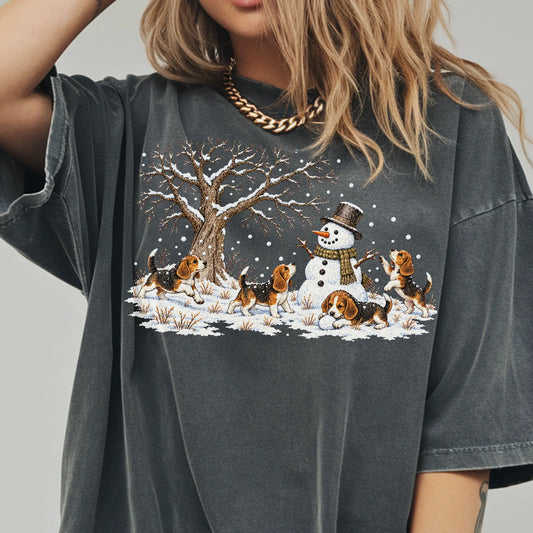 Beagle puppies playing in snow with a snowman on a Pepper T-shirt worn by a model
