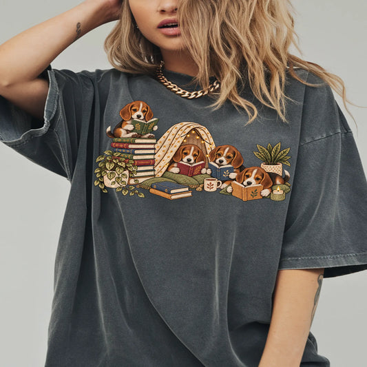 Beagle puppies reading books in a cozy blanket fort on a Pepper T-shirt worn by a model