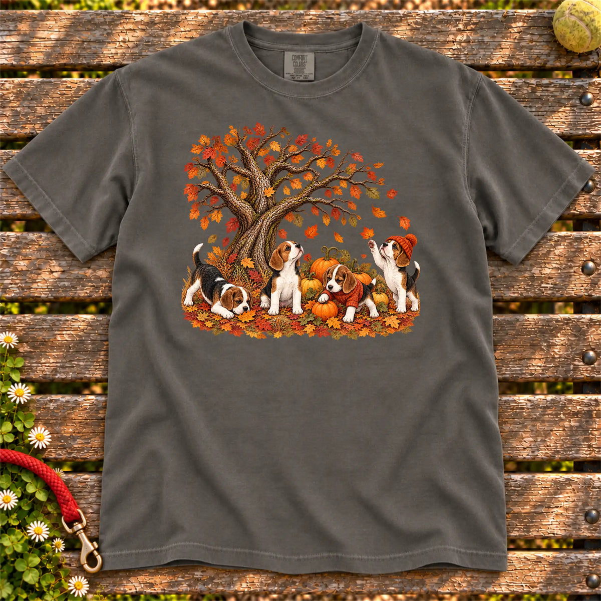 Four Beagle puppies with pumpkins beneath an autumn tree on a Pepper garment-dyed T-shirt