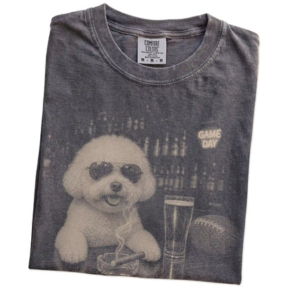 Folded Pepper Comfort Colors® T-shirt showing Bichon Frise with beer and football graphics