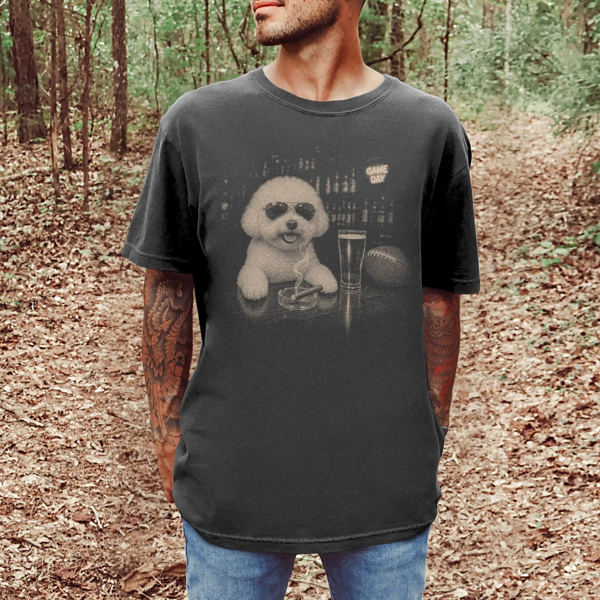 Model wearing a Pepper Comfort Colors® T-shirt featuring Bichon Frise with beer and football graphics