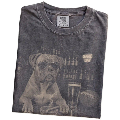 Folded Pepper Comfort Colors® T-shirt showing Boxer with beer and football graphics