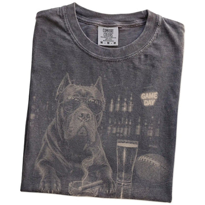 Folded Pepper Comfort Colors® T-shirt showing Cane Corso with beer and football graphics