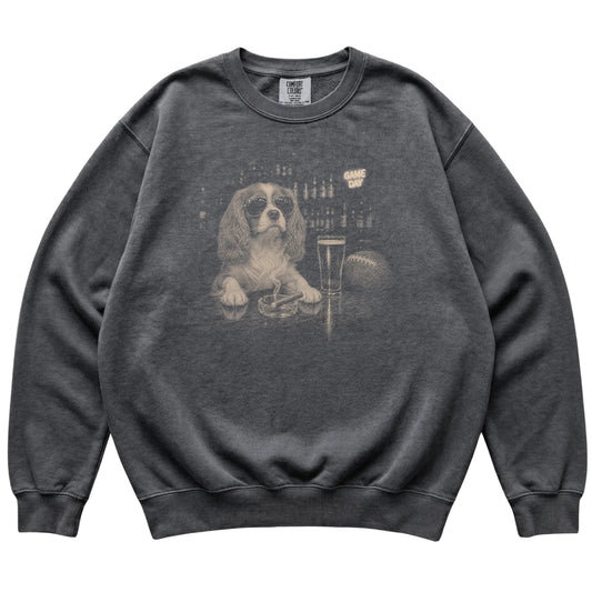 Pepper Beer and Football Cavalier King Charles Spaniel sweatshirt, laid flat