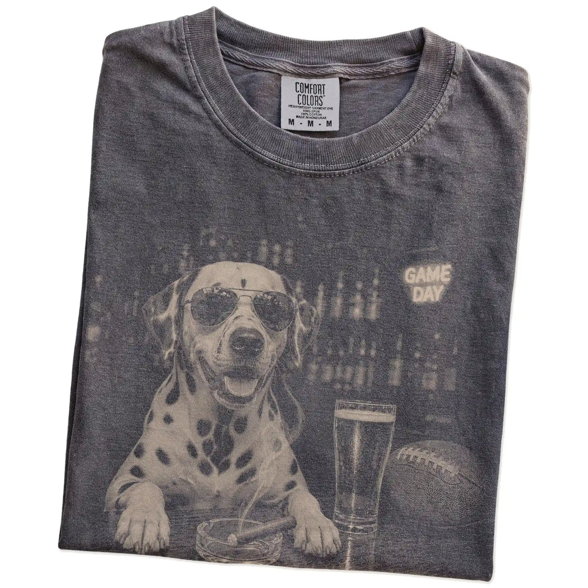 Folded Pepper Comfort Colors® T-shirt showing Dalmatian with beer and football graphics