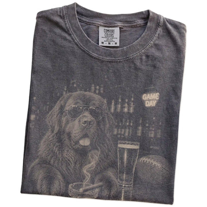Folded Pepper Comfort Colors® T-shirt showing Newfie with beer and football graphics