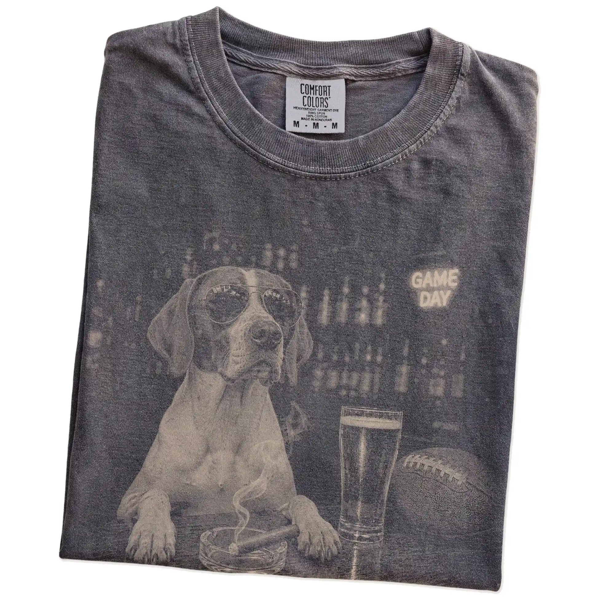 Folded Pepper Comfort Colors® T-shirt showing Pointer with beer and football graphics