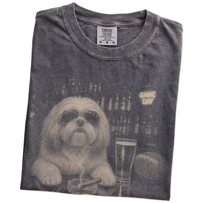 Folded Pepper Comfort Colors® T-shirt showing Shih Tzu with beer and football graphics