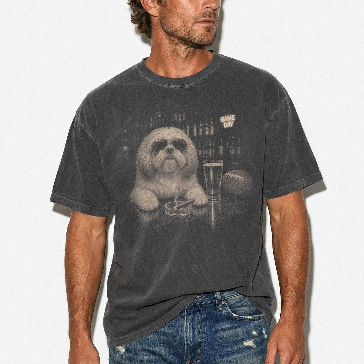 Model wearing a Pepper Comfort Colors® T-shirt featuring Shih Tzu with beer and football graphics